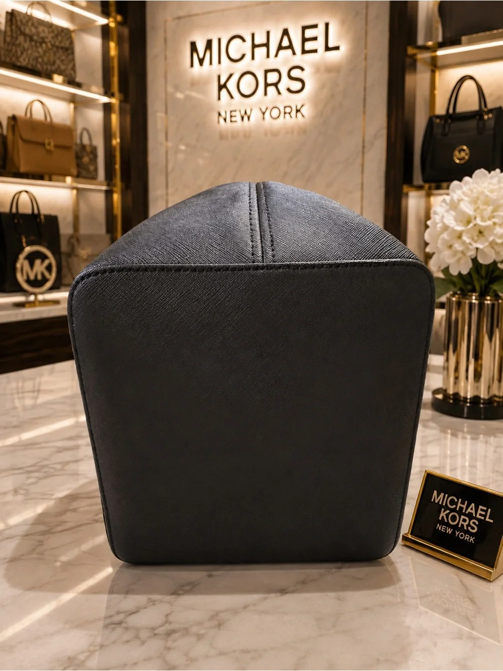 Michael Kors Saffiano leather paired in anaconda or python-print center